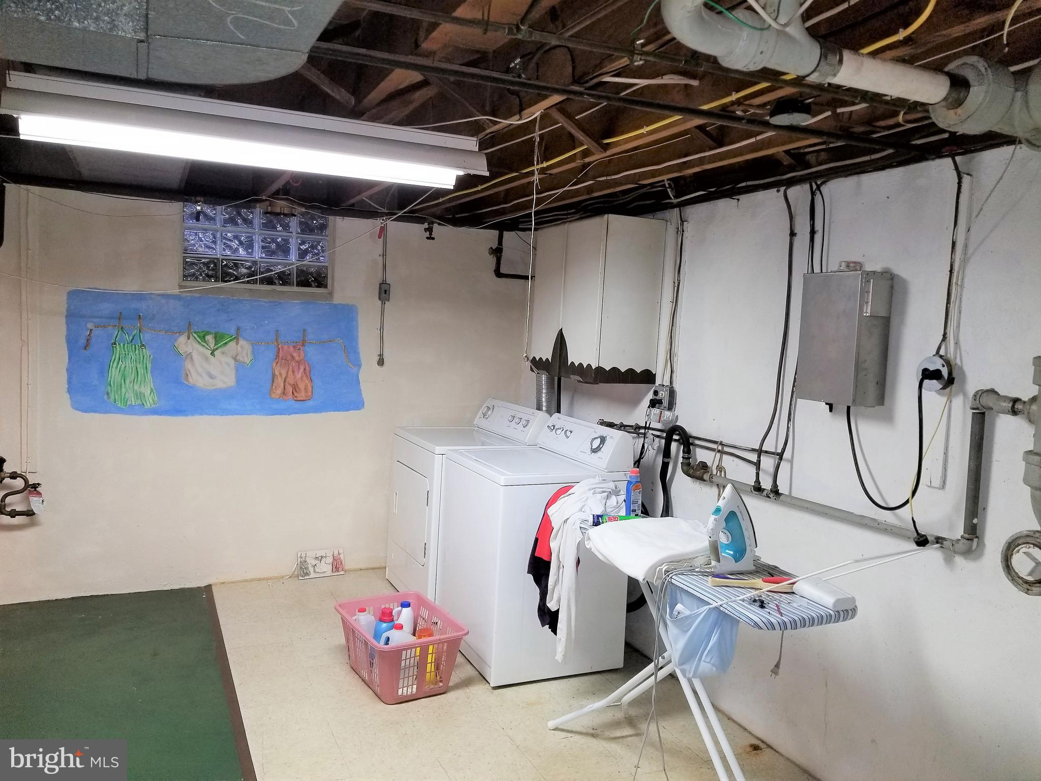 403 Oak Street Riverside, NJ 08075 - Photo 28 of 39 a view of gym equipment with racks on the wall