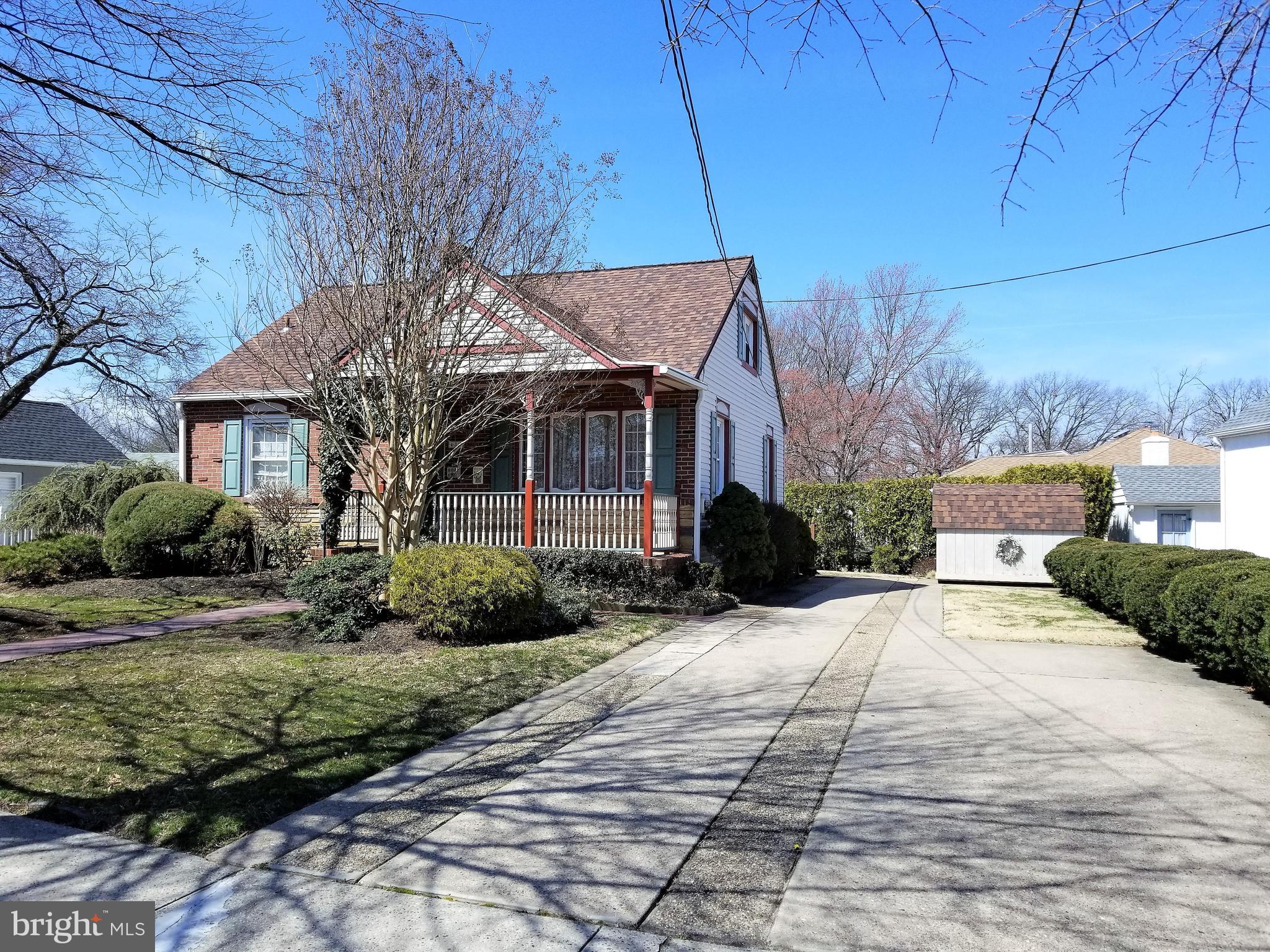 403 Oak Street Riverside, NJ 08075 - Photo 38 of 39 a front view of a house with a yard