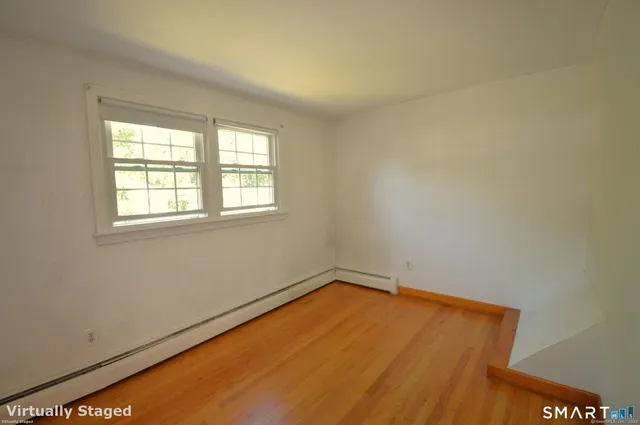 an empty room with a window