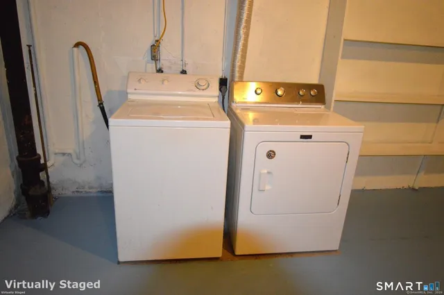 a utility room with dryer and washer