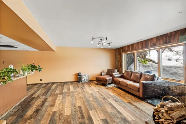 a view of a living room and entryway