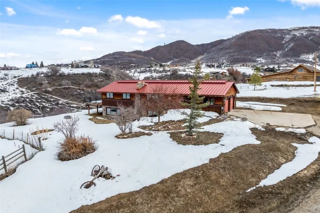 a view of swimming pool with outdoor seating