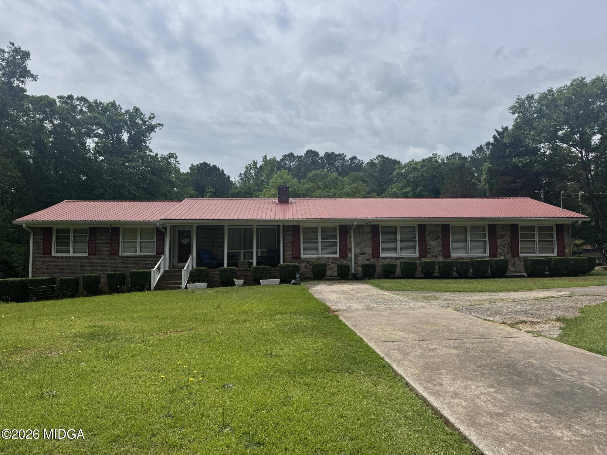 558 Old Brent Road Forsyth, GA 31029 - Photo 1 of 9 a view of a house with a yard