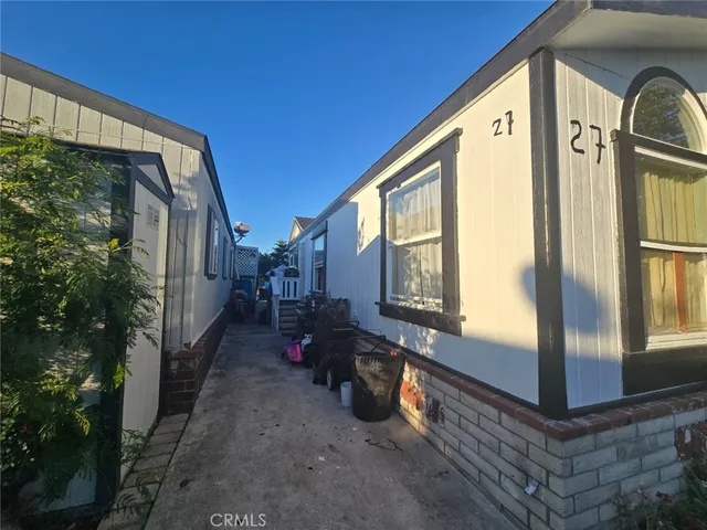 a view of a back yard from a balcony