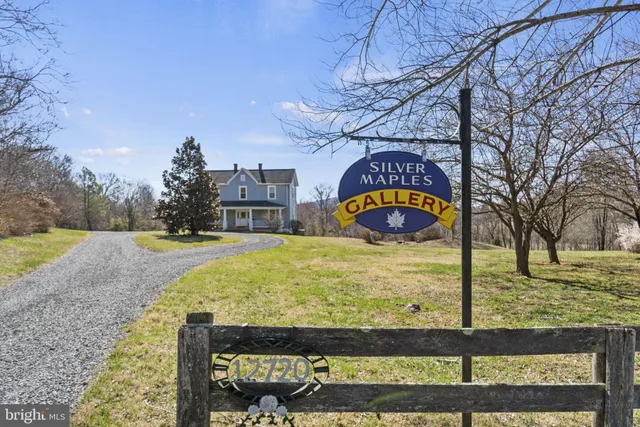a view of swimming pool with a yard