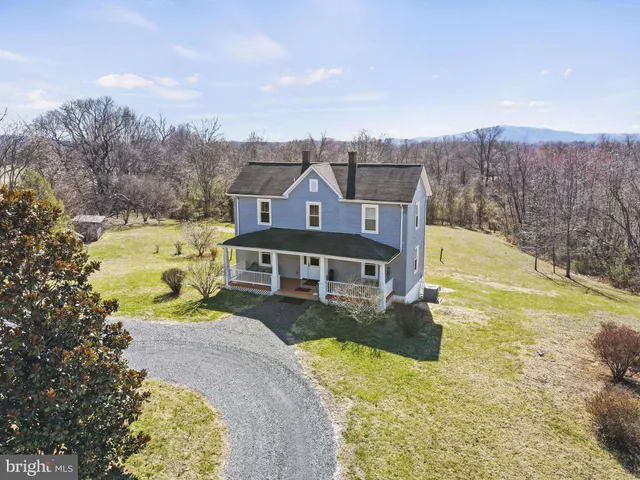 a view of a house with a big yard