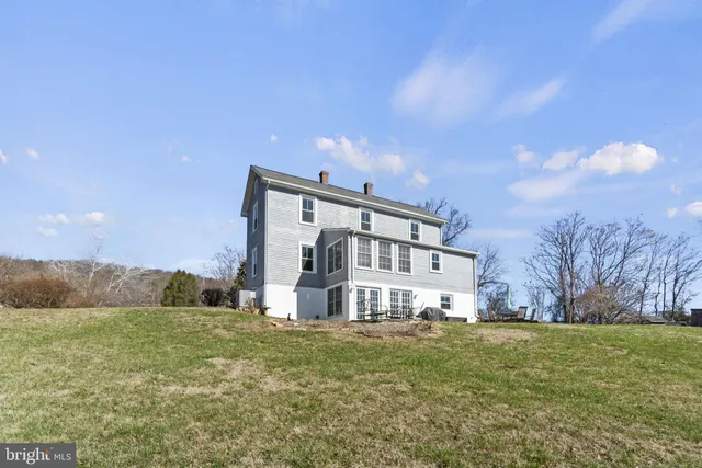 a view of a house with a big yard