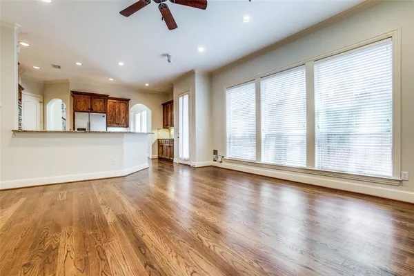 a view of room with wooden floor and window