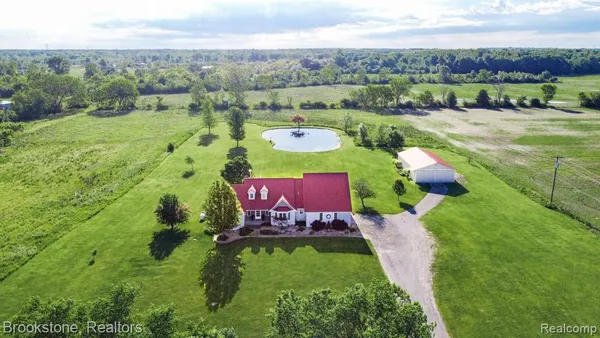 $569,900 | 62580 Omo Road, New Haven, MI 48048