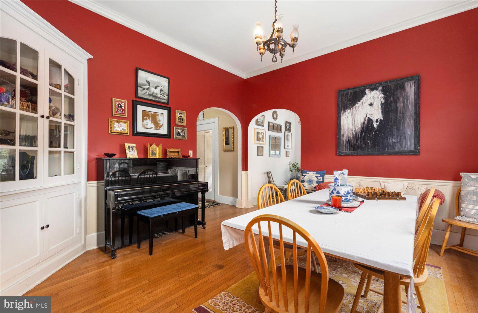 4 Washington Street Berlin, MD 21811 - Photo 14 of 125 a view of a dining room with furniture window and wooden floor