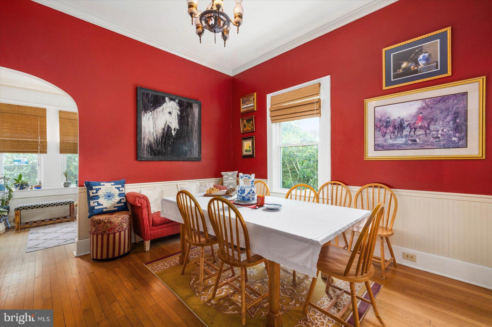 4 Washington Street Berlin, MD 21811 - Photo 15 of 125 a view of a dining room with furniture window and wooden floor