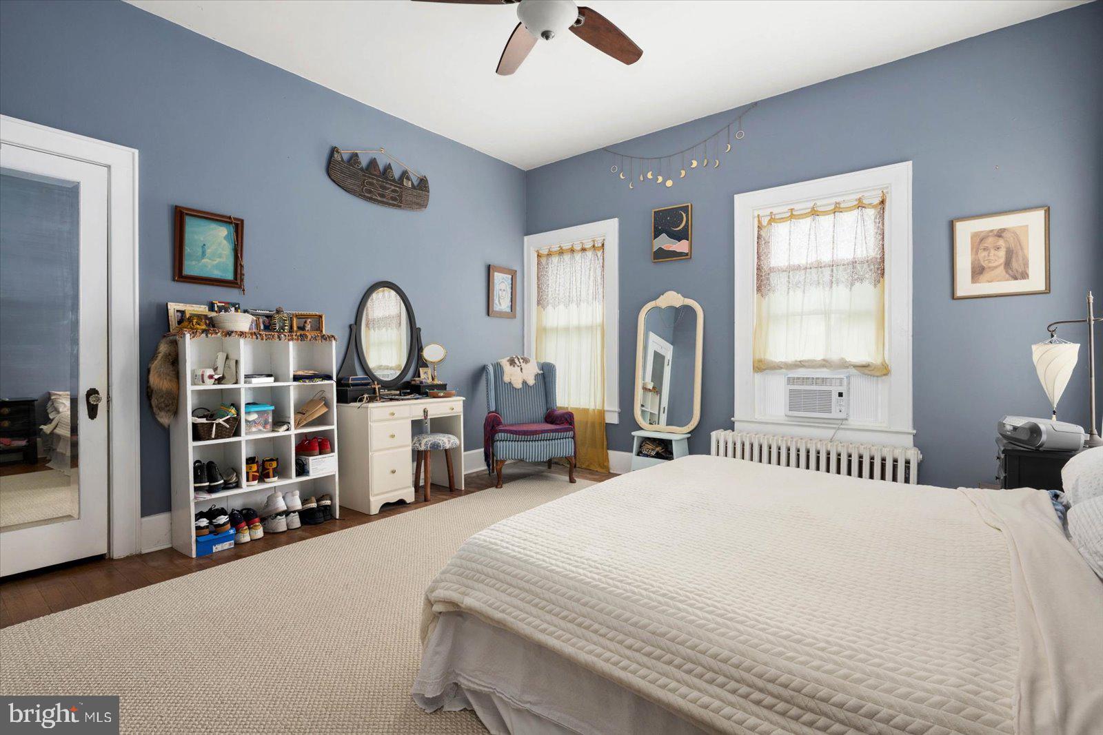 4 Washington Street Berlin, MD 21811 - Photo 28 of 125 a bedroom with bed and a window