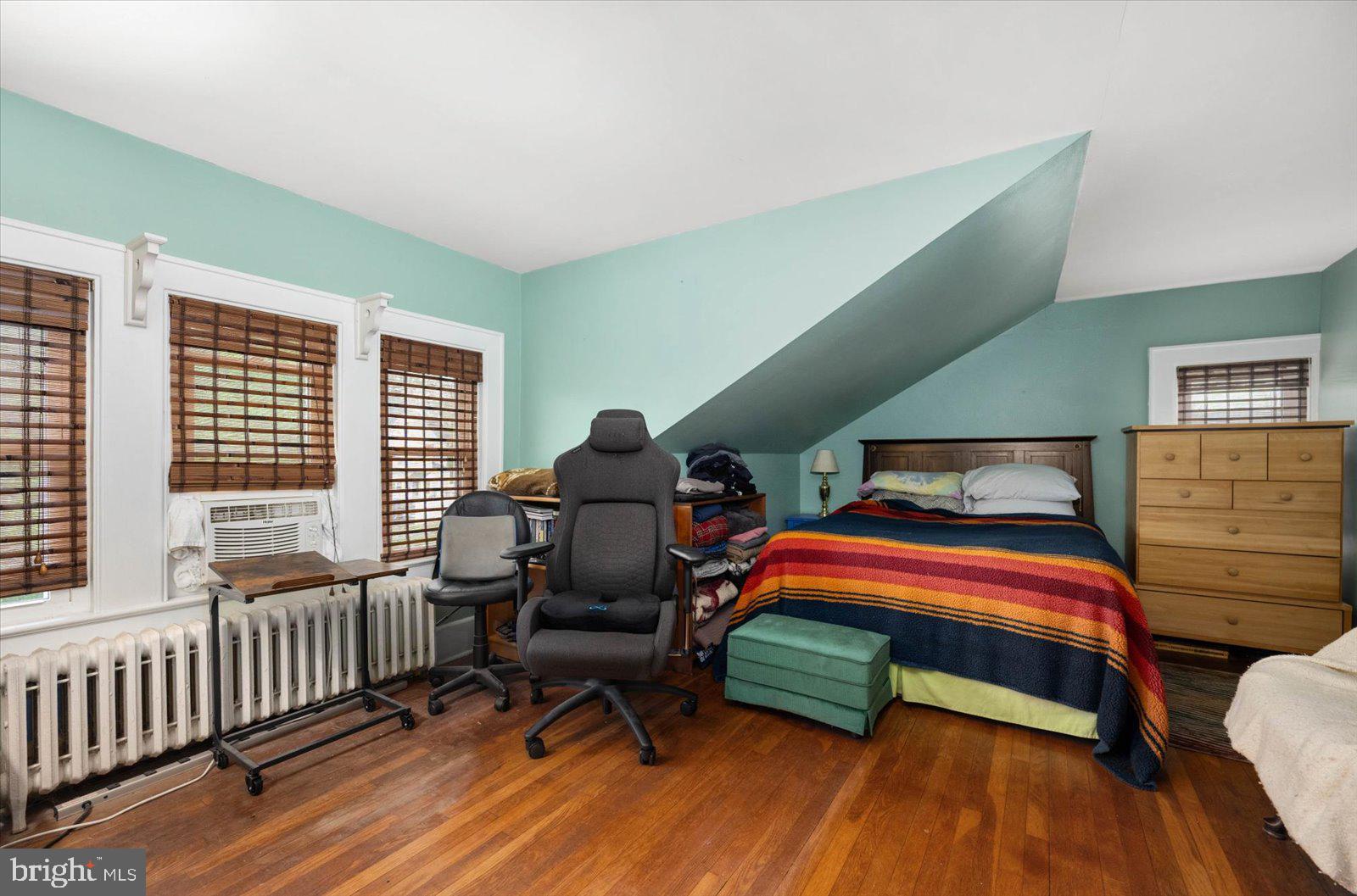 4 Washington Street Berlin, MD 21811 - Photo 36 of 125 a bedroom with furniture and a window