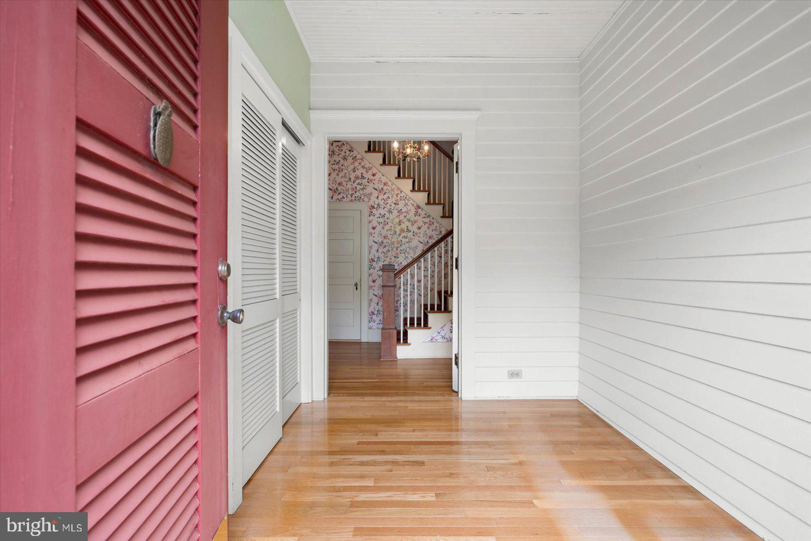 4 Washington Street Berlin, MD 21811 - Photo 39 of 125 a view of a hallway with wooden floor and entryway