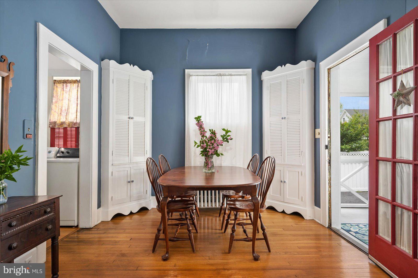 4 Washington Street Berlin, MD 21811 - Photo 52 of 125 a view of a dining room with furniture and a potted plant