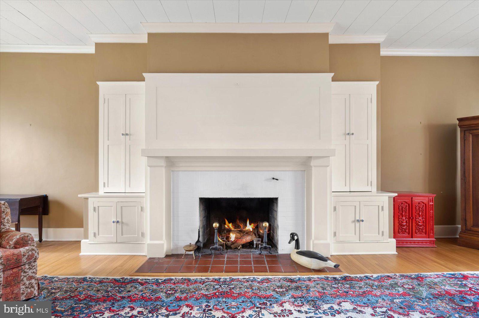 4 Washington Street Berlin, MD 21811 - Photo 67 of 125 a living room with furniture and a fireplace