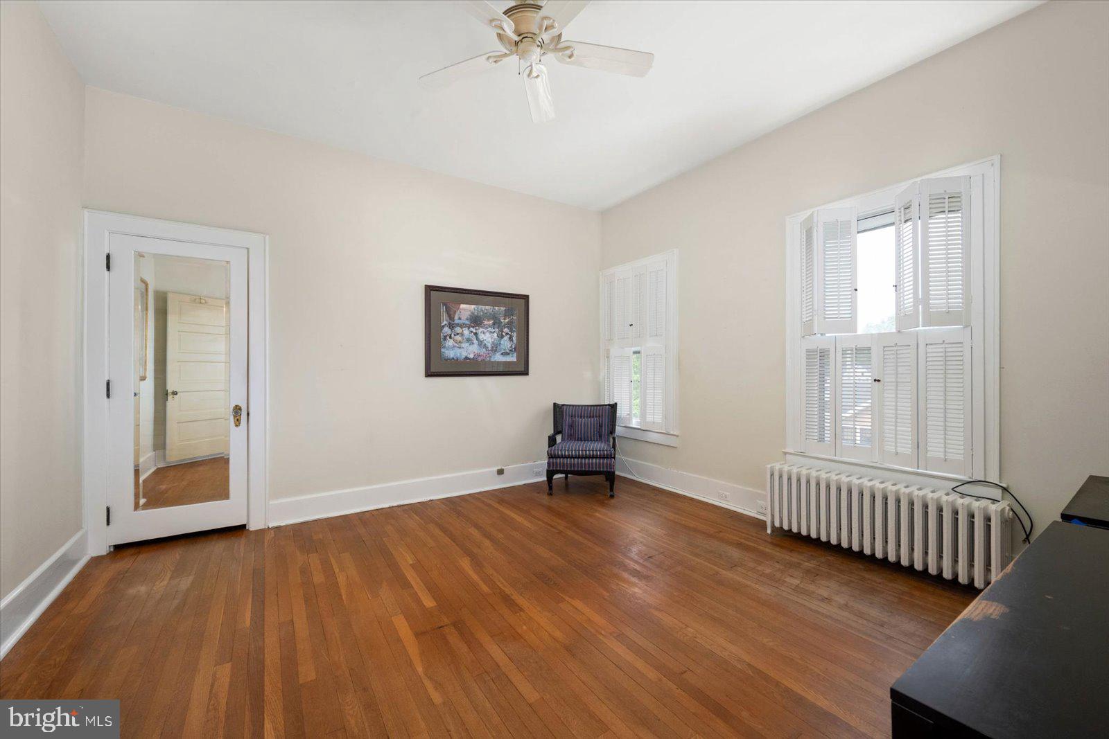 4 Washington Street Berlin, MD 21811 - Photo 71 of 125 wooden floor in an empty room with a window