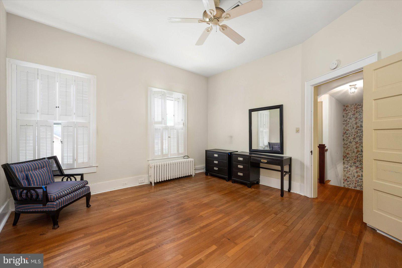 4 Washington Street Berlin, MD 21811 - Photo 72 of 125 a living room with furniture and a wooden floor