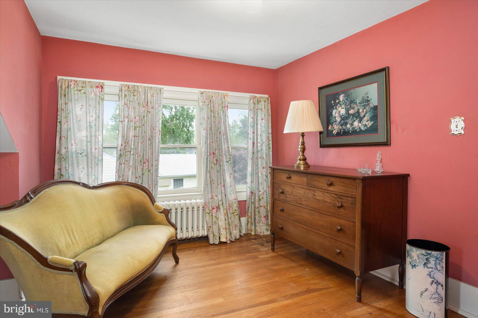 4 Washington Street Berlin, MD 21811 - Photo 78 of 125 a bedroom with a bed and a couch