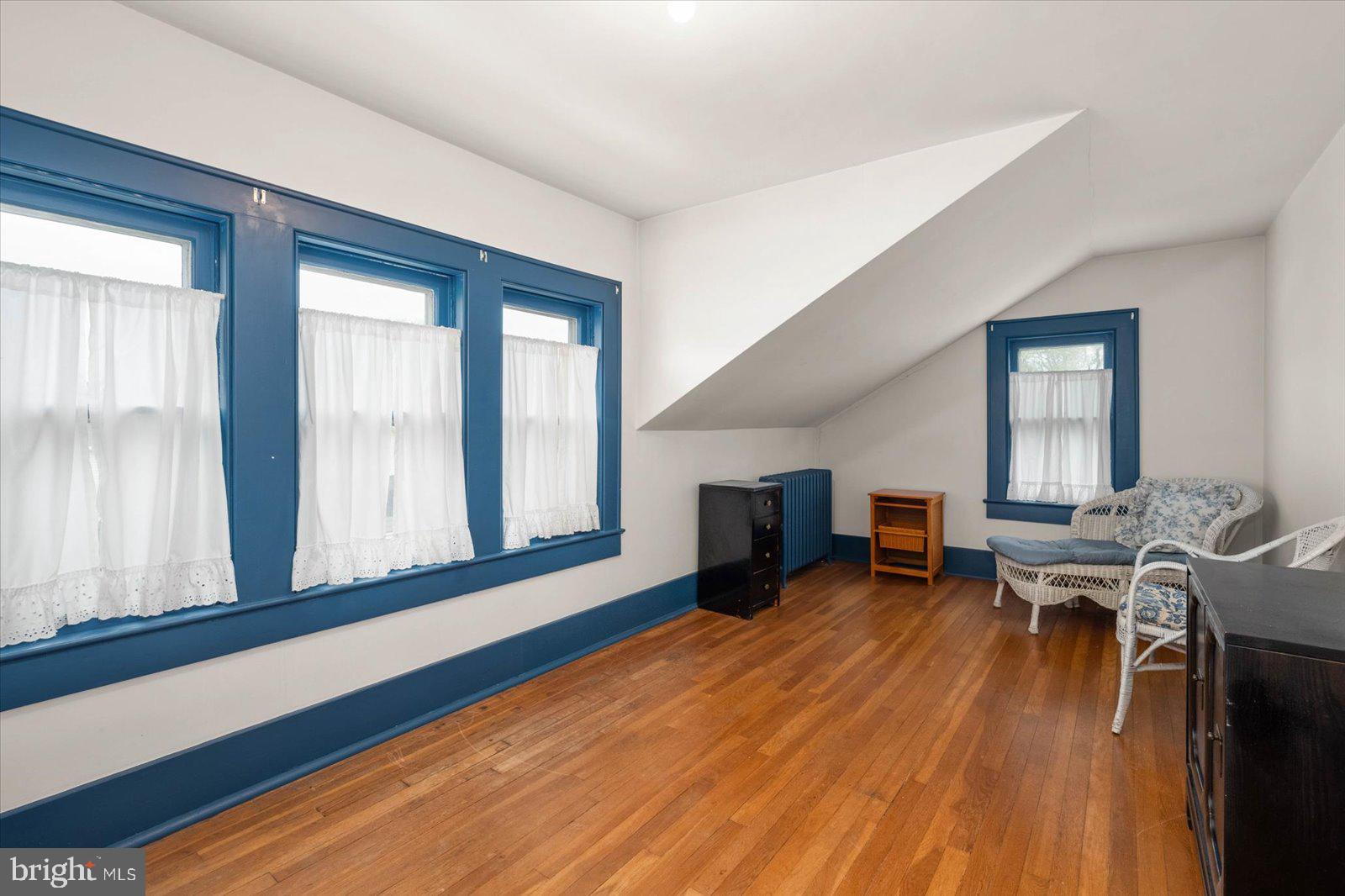 4 Washington Street Berlin, MD 21811 - Photo 81 of 125 a living room with furniture and a wooden floor