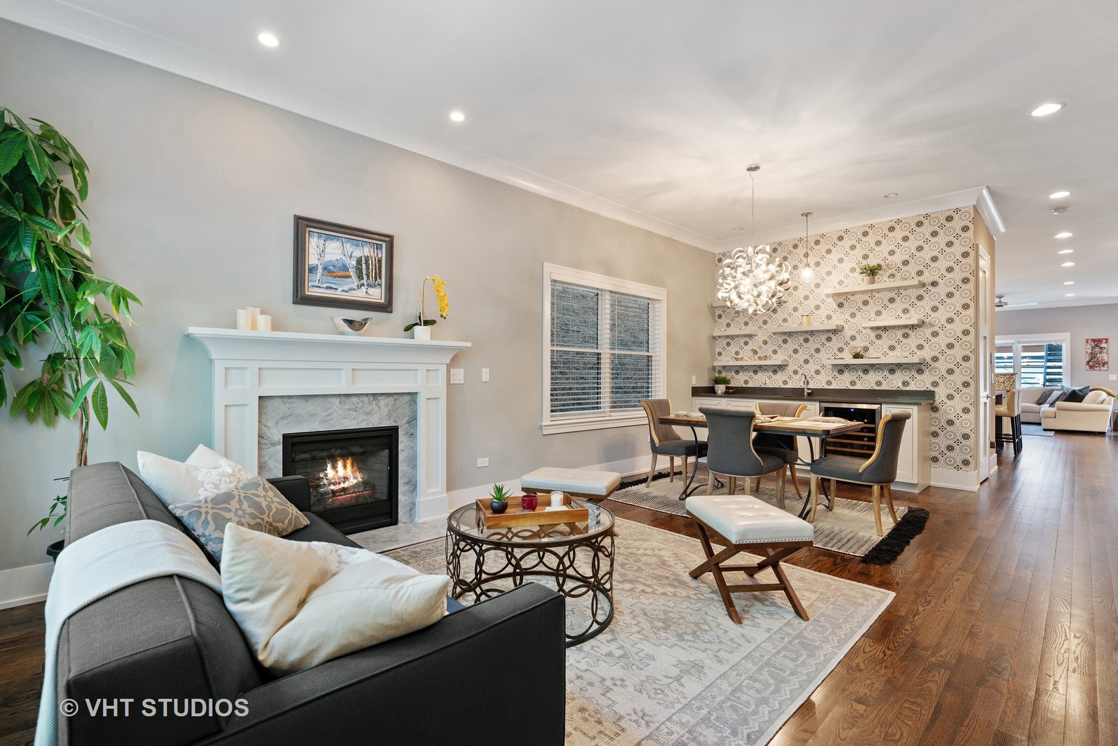 1734 West Henderson Street Chicago, IL 60657 - Photo 2 of 24 a living room with furniture and a fireplace