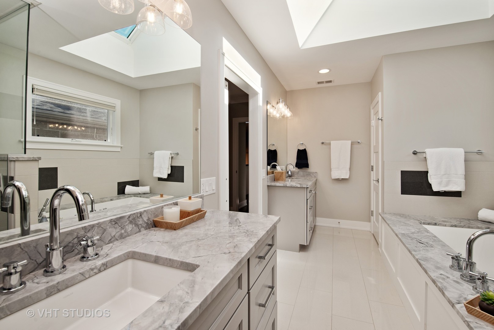 1734 West Henderson Street Chicago, IL 60657 - Photo 12 of 24 a bathroom with a sink and a mirror