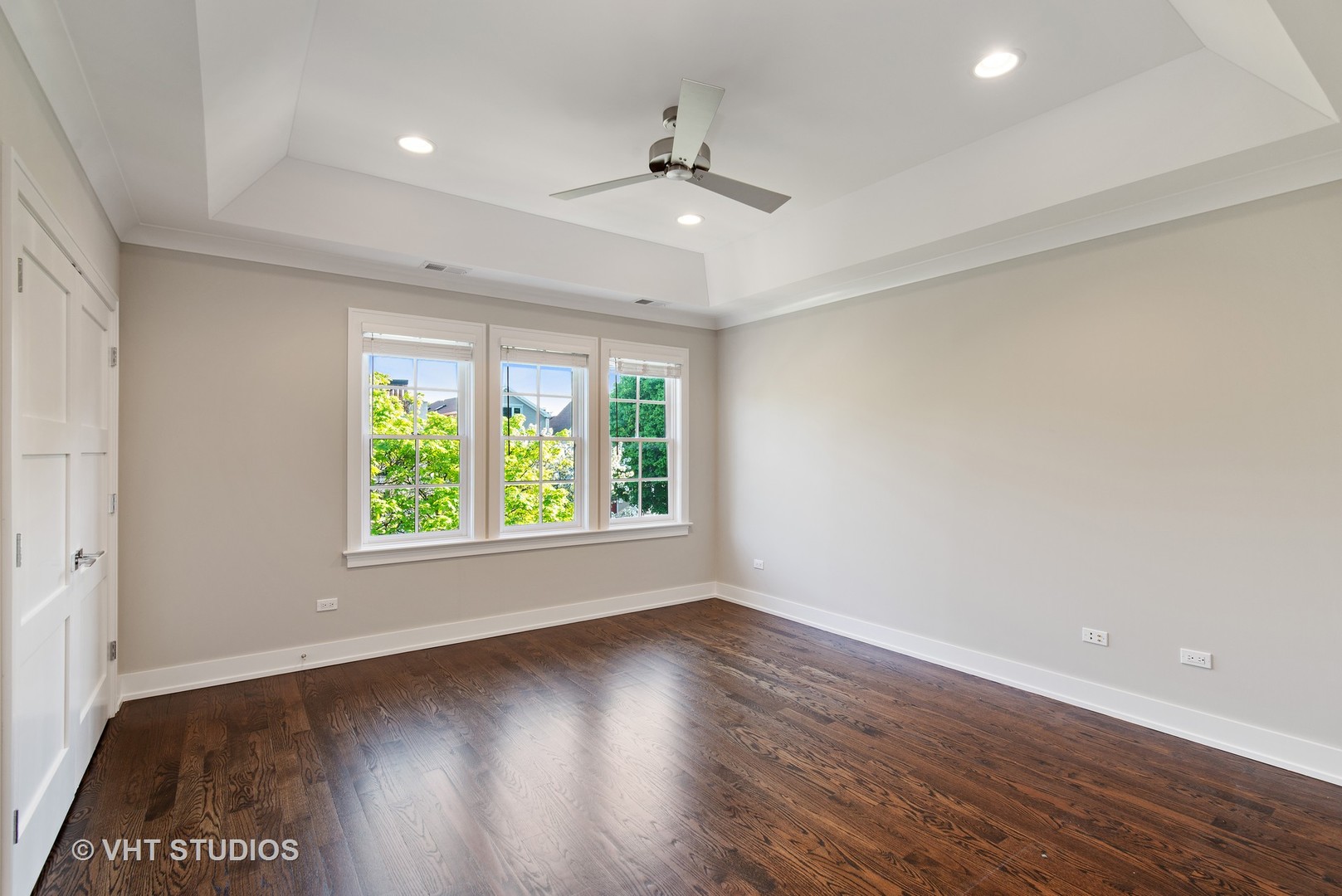 1734 West Henderson Street Chicago, IL 60657 - Photo 13 of 24 an empty room with wooden floor and windows