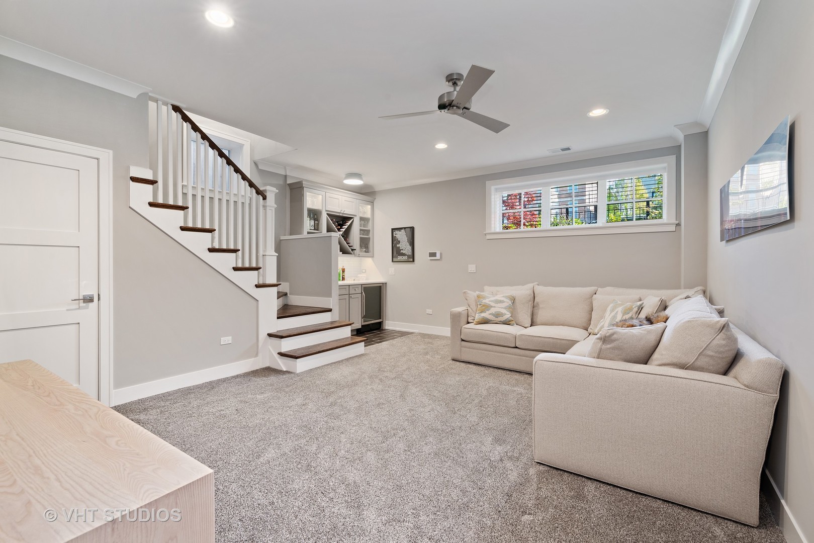 1734 West Henderson Street Chicago, IL 60657 - Photo 16 of 24 a living room with furniture and a ceiling fan