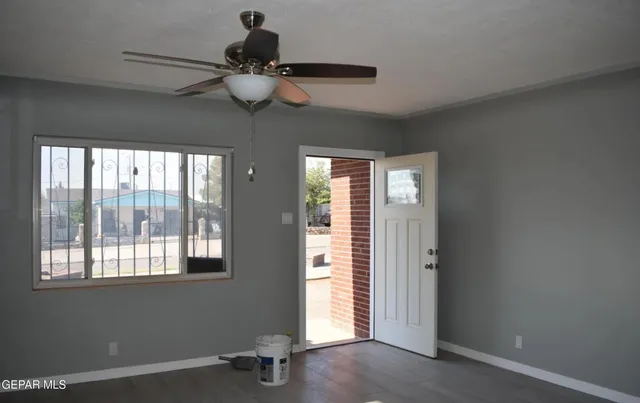 an empty room with windows