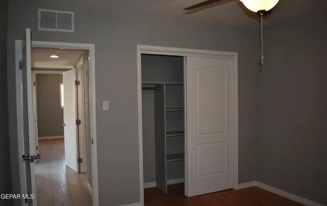 an empty room with closet