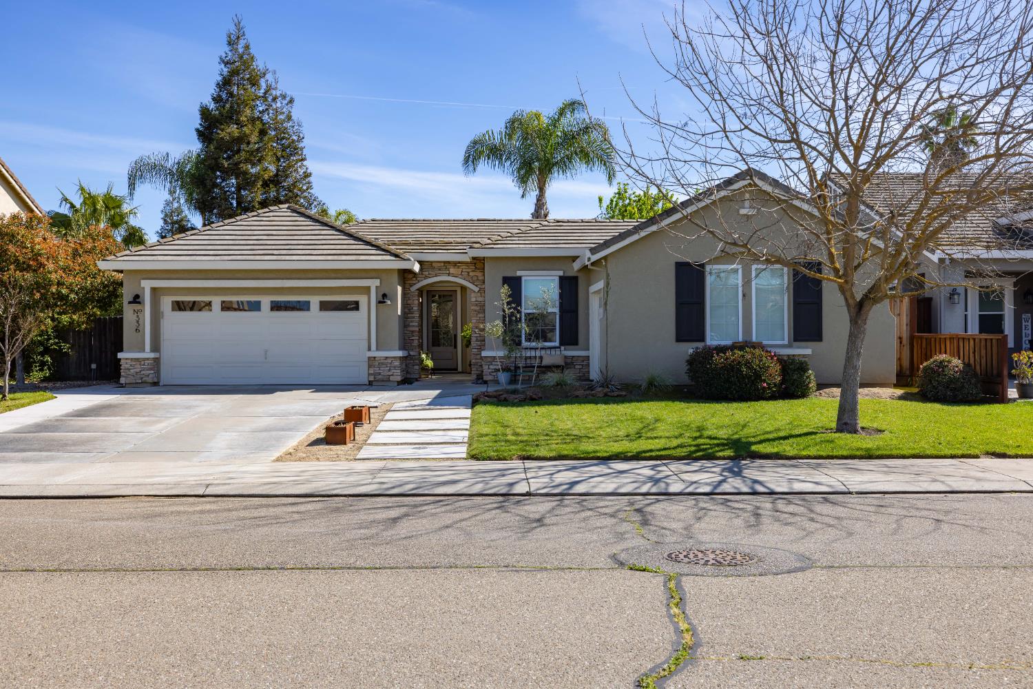 336 Kristen Way Ripon, CA 95366 - Photo 1 of 1 a house view with a garden space