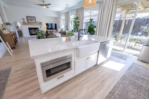 a view of a livingroom with furniture and wooden floor