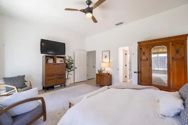 a view of a swimming pool with chairs