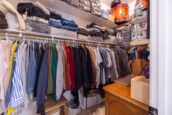 a view of a chairs and table in the balcony