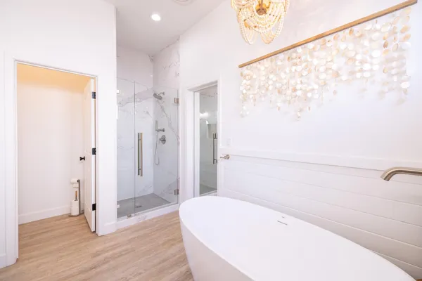 a view of a house with backyard porch and patio