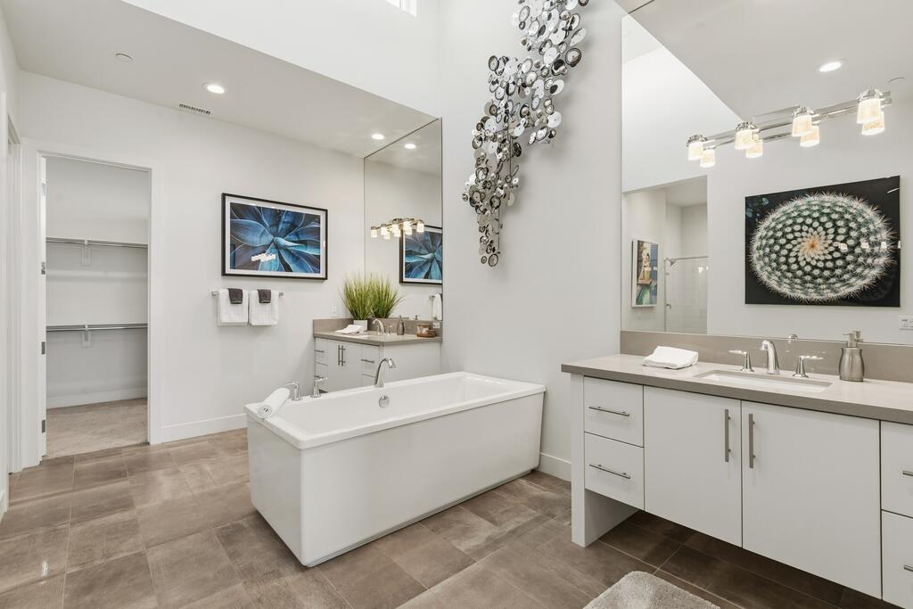 1200 Celadon Street Palm Springs, CA 92262 - Photo 16 of 47 a bathroom with a double vanity sink mirror and bathtub