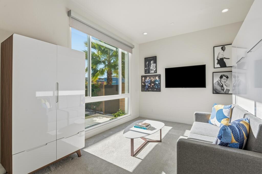 1200 Celadon Street Palm Springs, CA 92262 - Photo 20 of 47 a living room with furniture and a flat screen tv