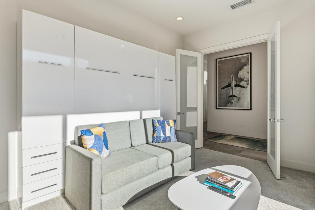 1200 Celadon Street Palm Springs, CA 92262 - Photo 21 of 47 a living room with furniture and a couch