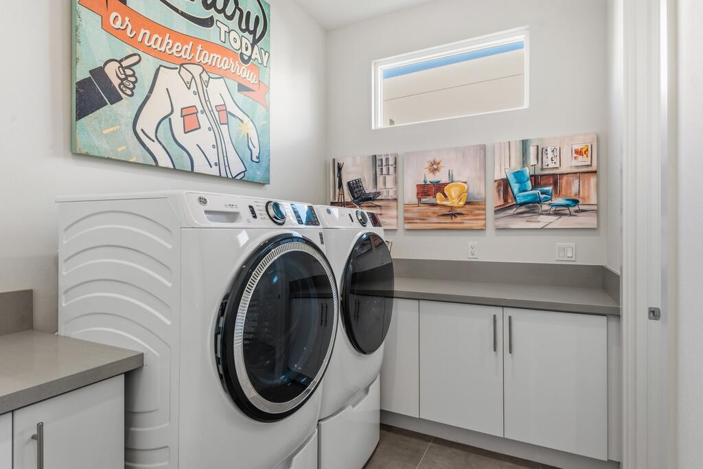 1200 Celadon Street Palm Springs, CA 92262 - Photo 23 of 47 a utility room with multiple dryer and washer