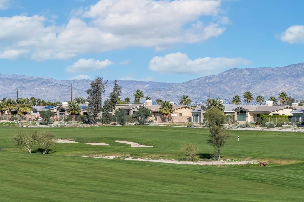 1200 Celadon Street Palm Springs, CA 92262 - Photo 42 of 47 a view of a golf course with a field
