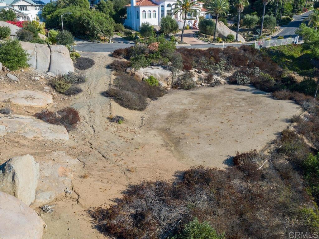 9782 Crystal Ridge Drive Escondido, CA 92026 - Photo 20 of 31 a view of a dry yard with wooden fence