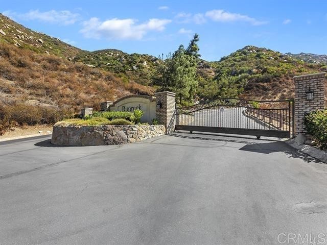 9782 Crystal Ridge Drive Escondido, CA 92026 - Photo 29 of 31 a car parked on the side of a road