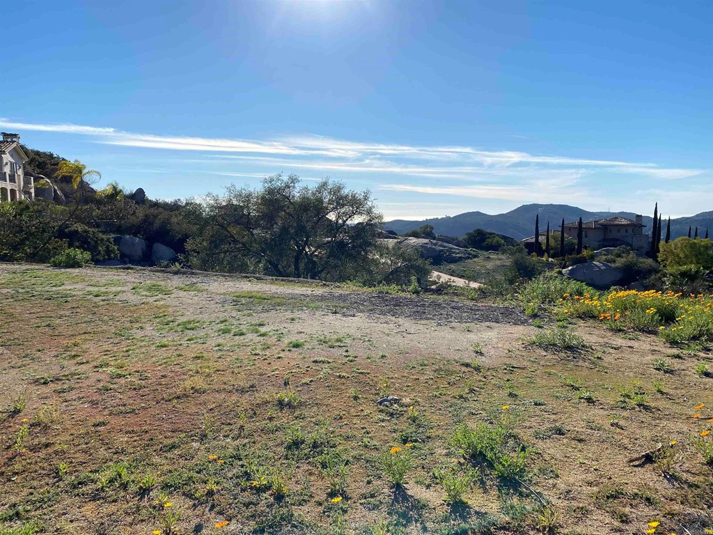 9782 Crystal Ridge Drive Escondido, CA 92026 - Photo 8 of 31 a view of a lake with mountains in the background