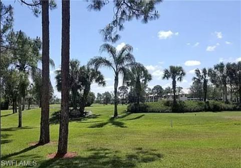 175 Turtle Lake Court, Unit 111 Naples, FL 34105 - Photo 2 of 19 a view of a park