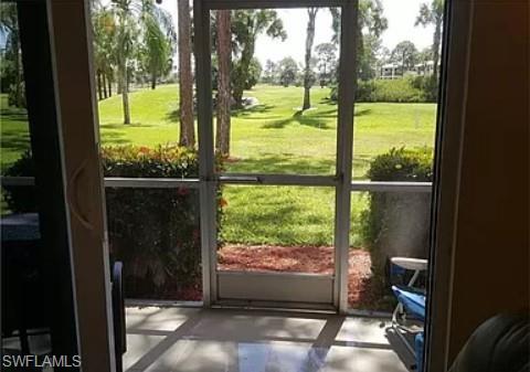 175 Turtle Lake Court, Unit 111 Naples, FL 34105 - Photo 4 of 19 a view of a porch