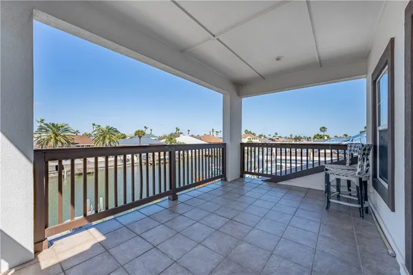 a view of a swimming pool with a lake view