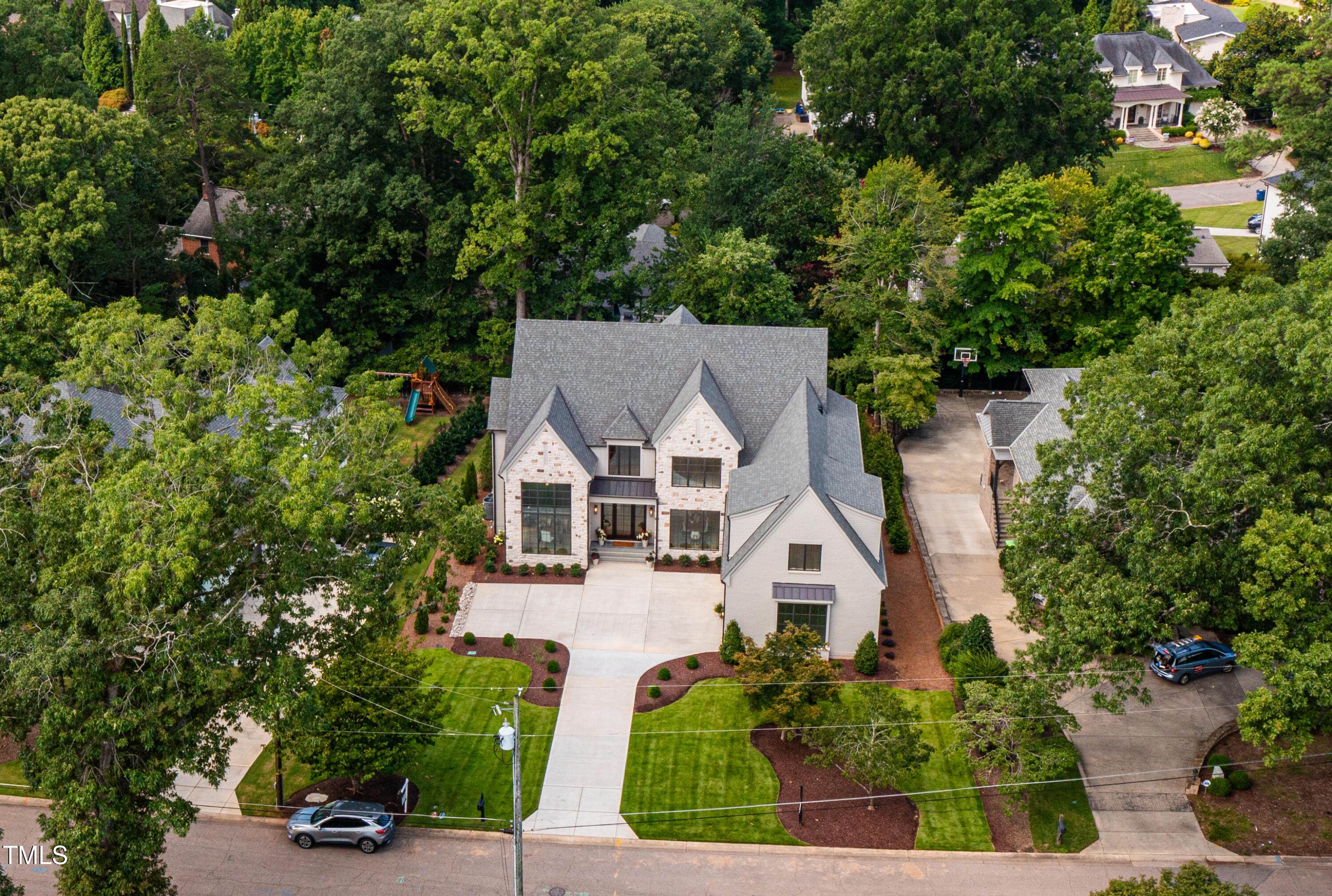 2227 Wheeler Road Raleigh, NC 27607 - Photo 56 of 56 an aerial view of a house with a yard
