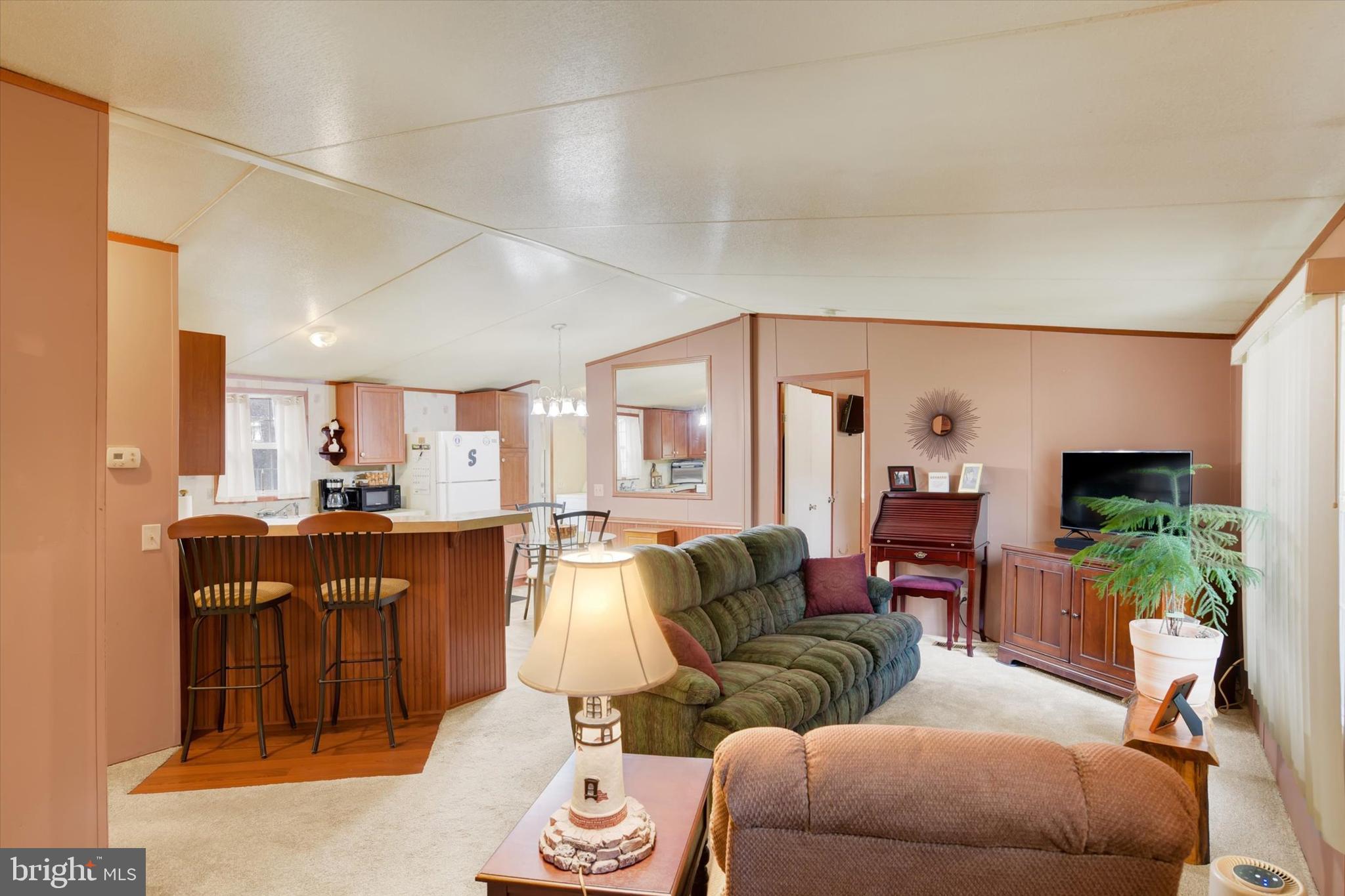 1 Rovak Drive Middletown, PA 17057 - Photo 8 of 18 a living room with furniture kitchen view and a large window