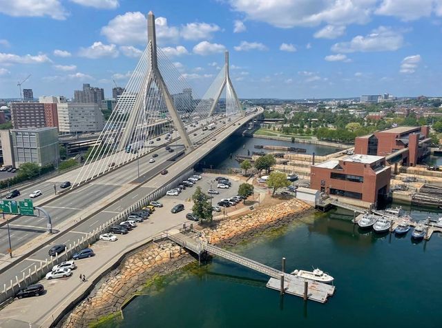 front view of a brick building with many windows
