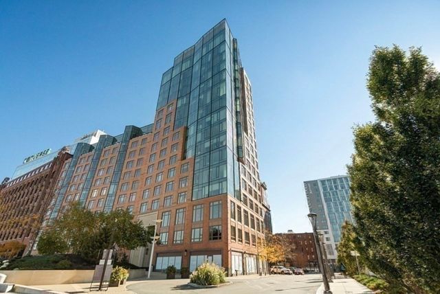 a building exterior with a glass door